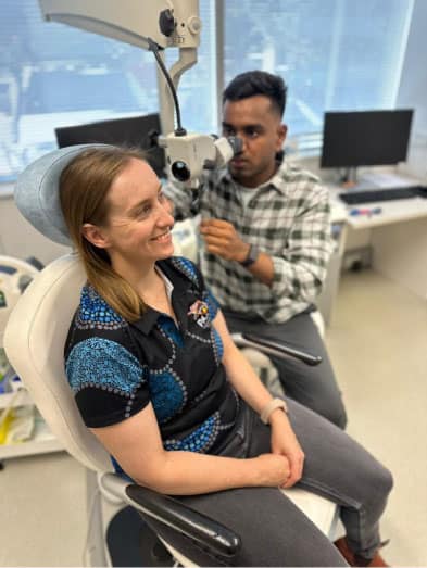 Doctor testing a diagnostic scope for ear and hearing disorders during clinician training.