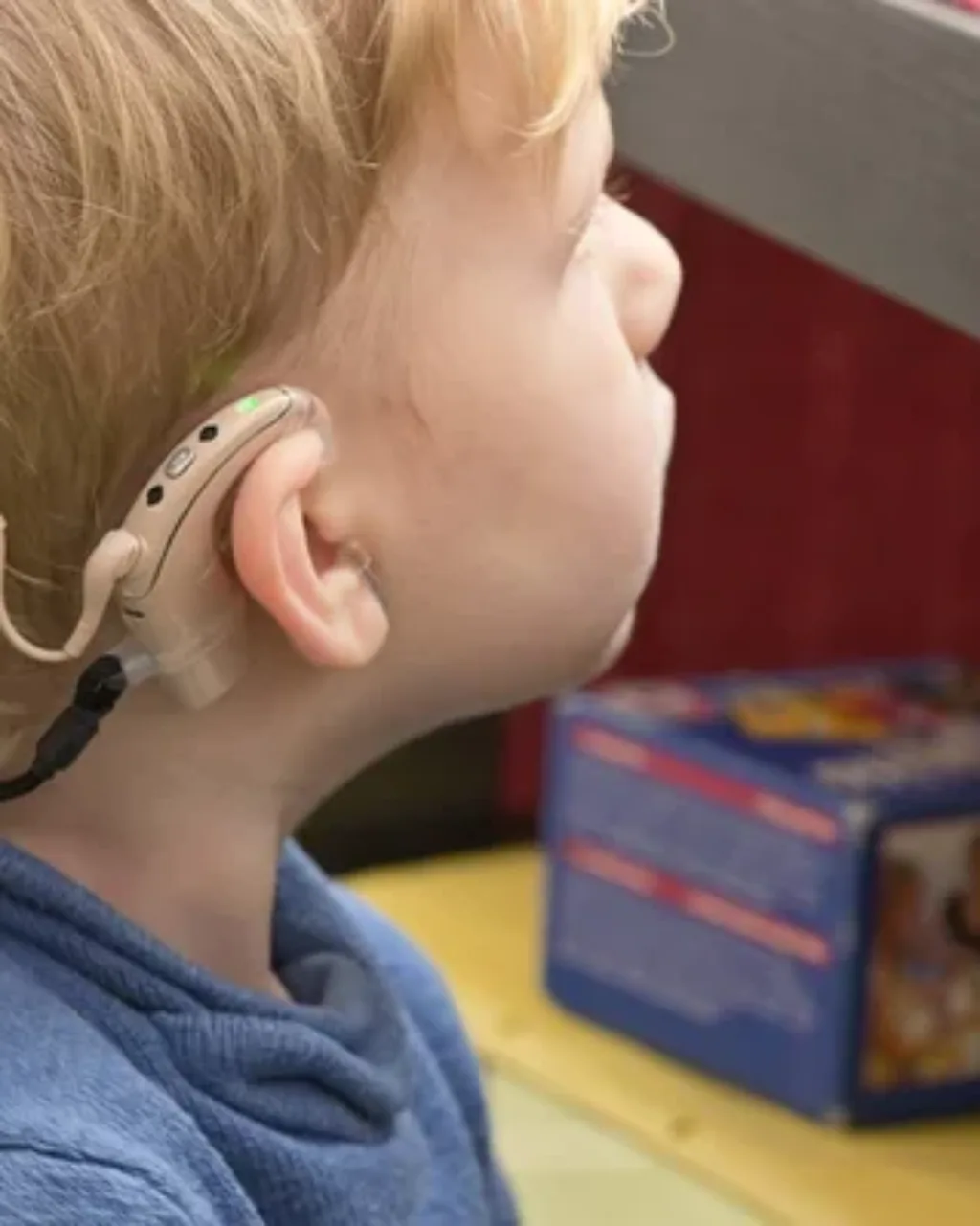 Young-Boy-with-Cochlear-Implant-Hearing-Aid